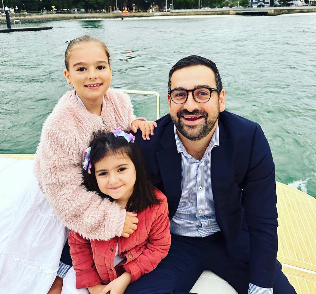 Christian on Sydney Harbour with his two daughters